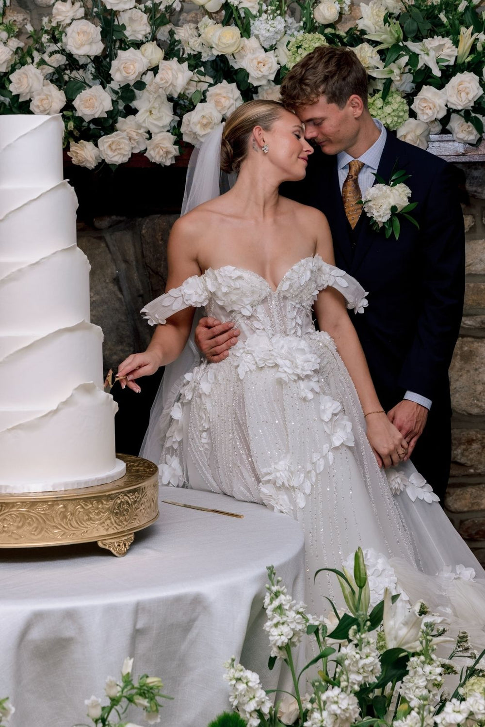 hand-crafted 3D floral embellishments on the Allure couture wedding dress bodice