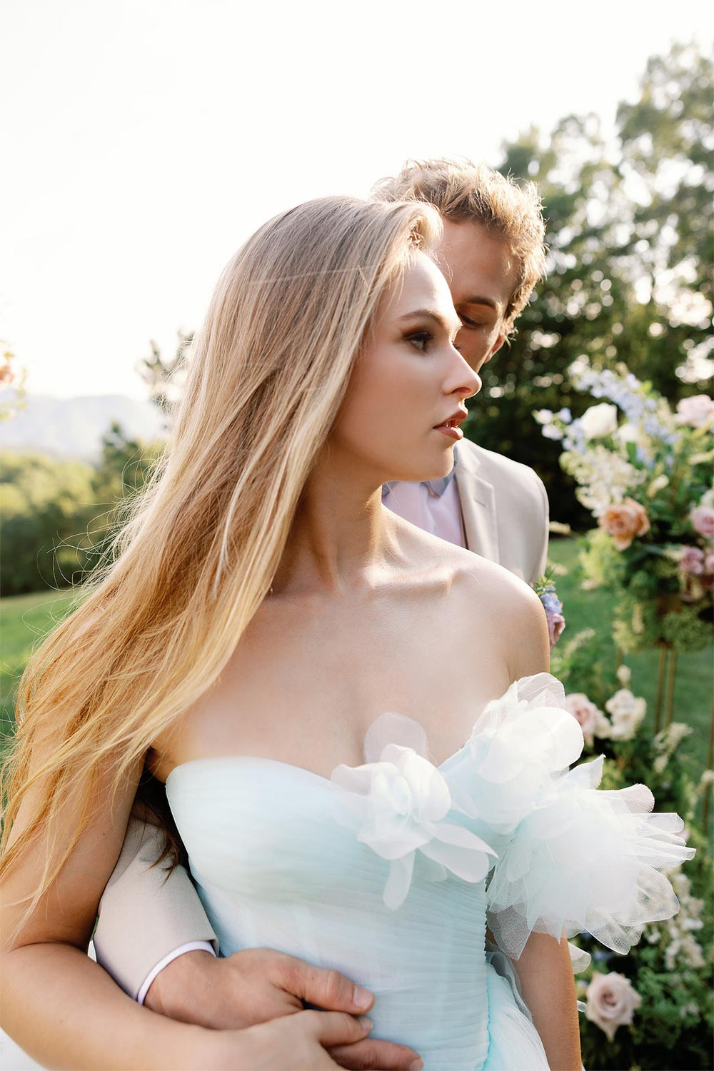 Close view of the Belle wedding dress sweetheart neckline with hand-pleated boned bustier bodice detail