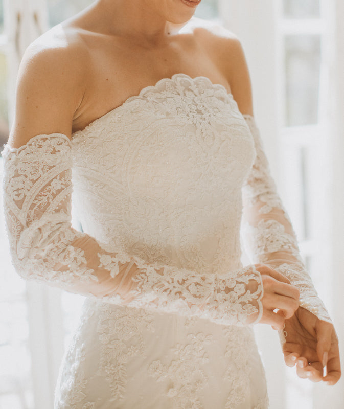 Close-up of Jessica's custom long sleeve wedding dress by Angela Kim Couture – intricate sleeve detailing on a bespoke bridal gown made for a petite bride