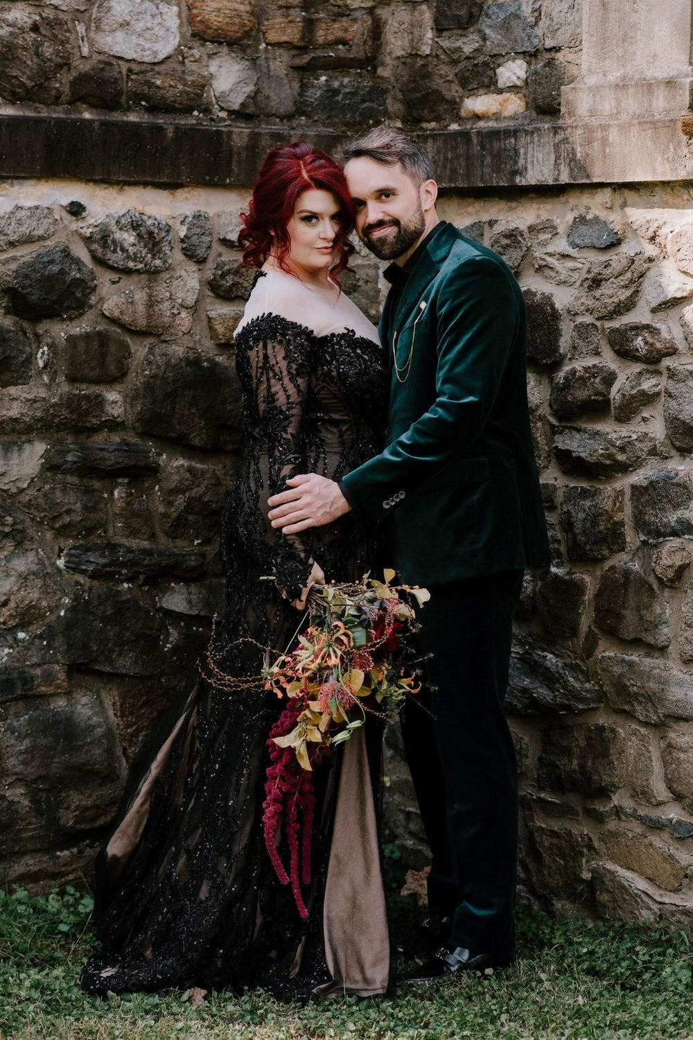 bride wearing the Kati gothic black lace beaded wedding gown by Angela Kim Couture with off-shoulder corset bodice