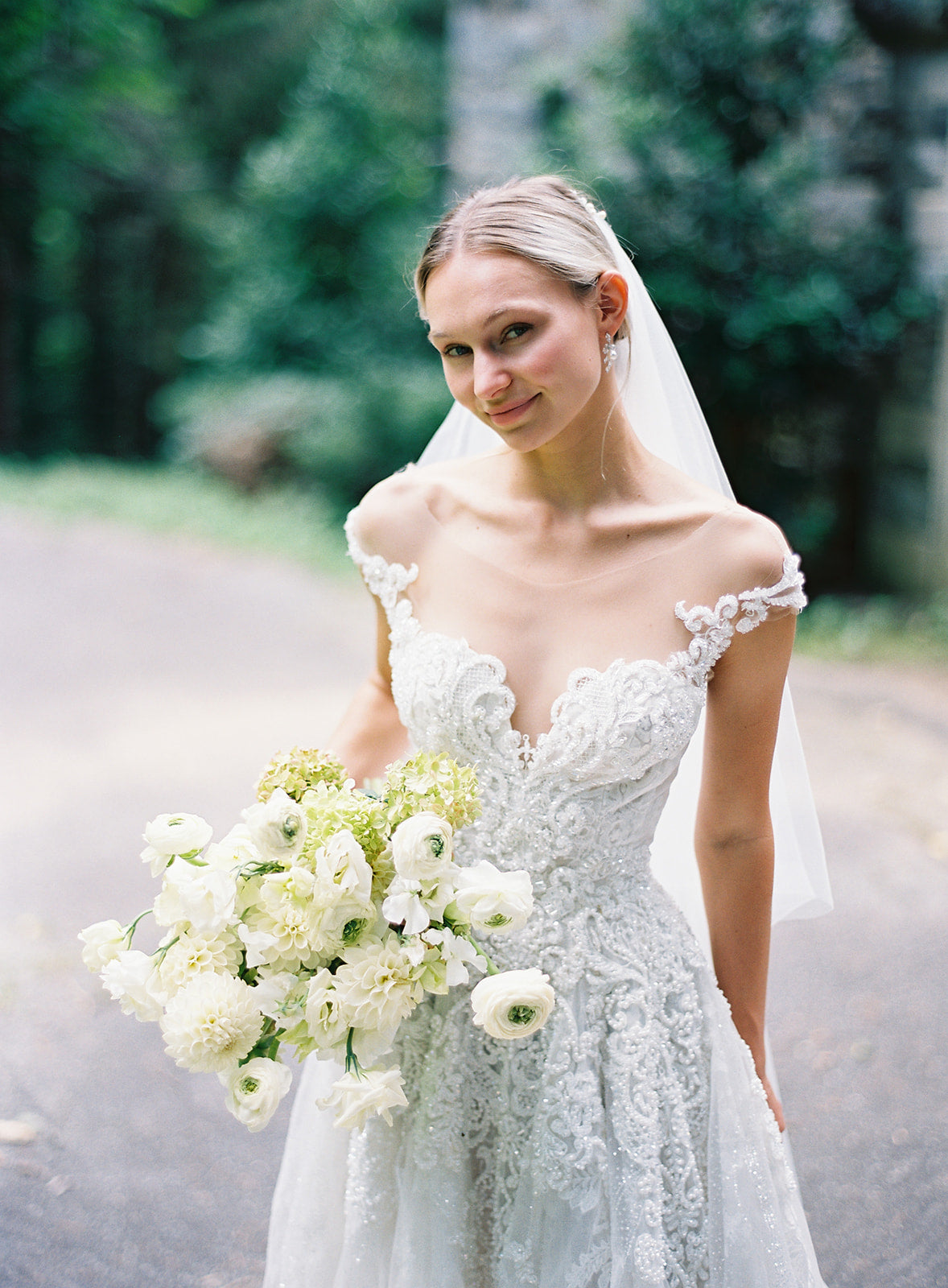 Natalie wearing heavily beaded couture gown by Angela Kim Couture