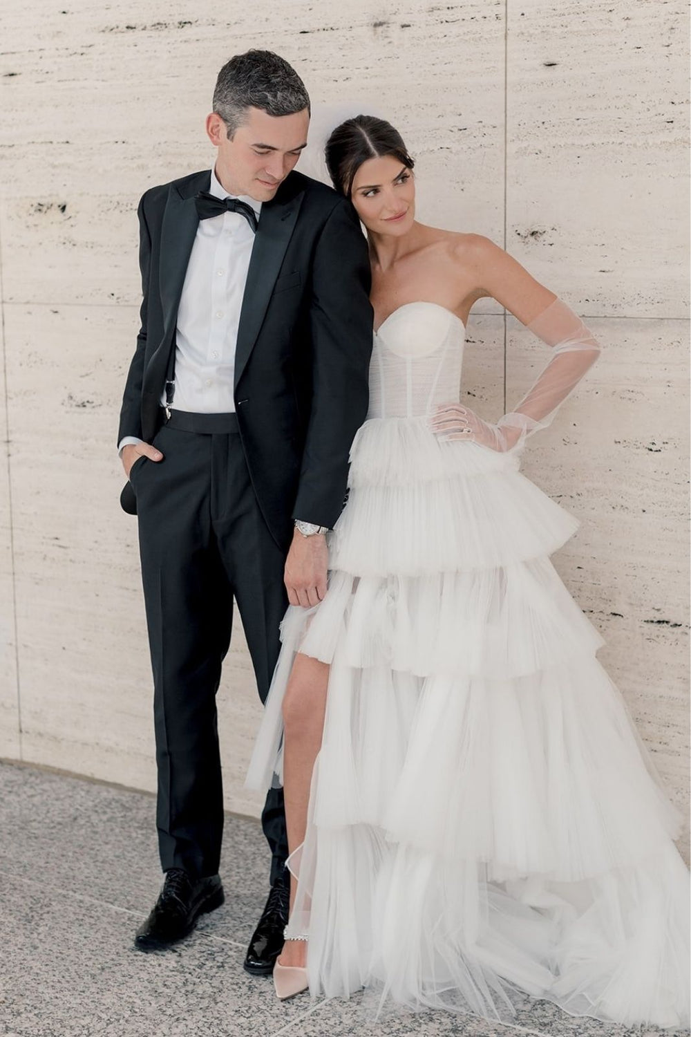 Close-up of the hand-pleated tiered tulle skirt on the Rachel couture wedding dress with graduating pleat sizes