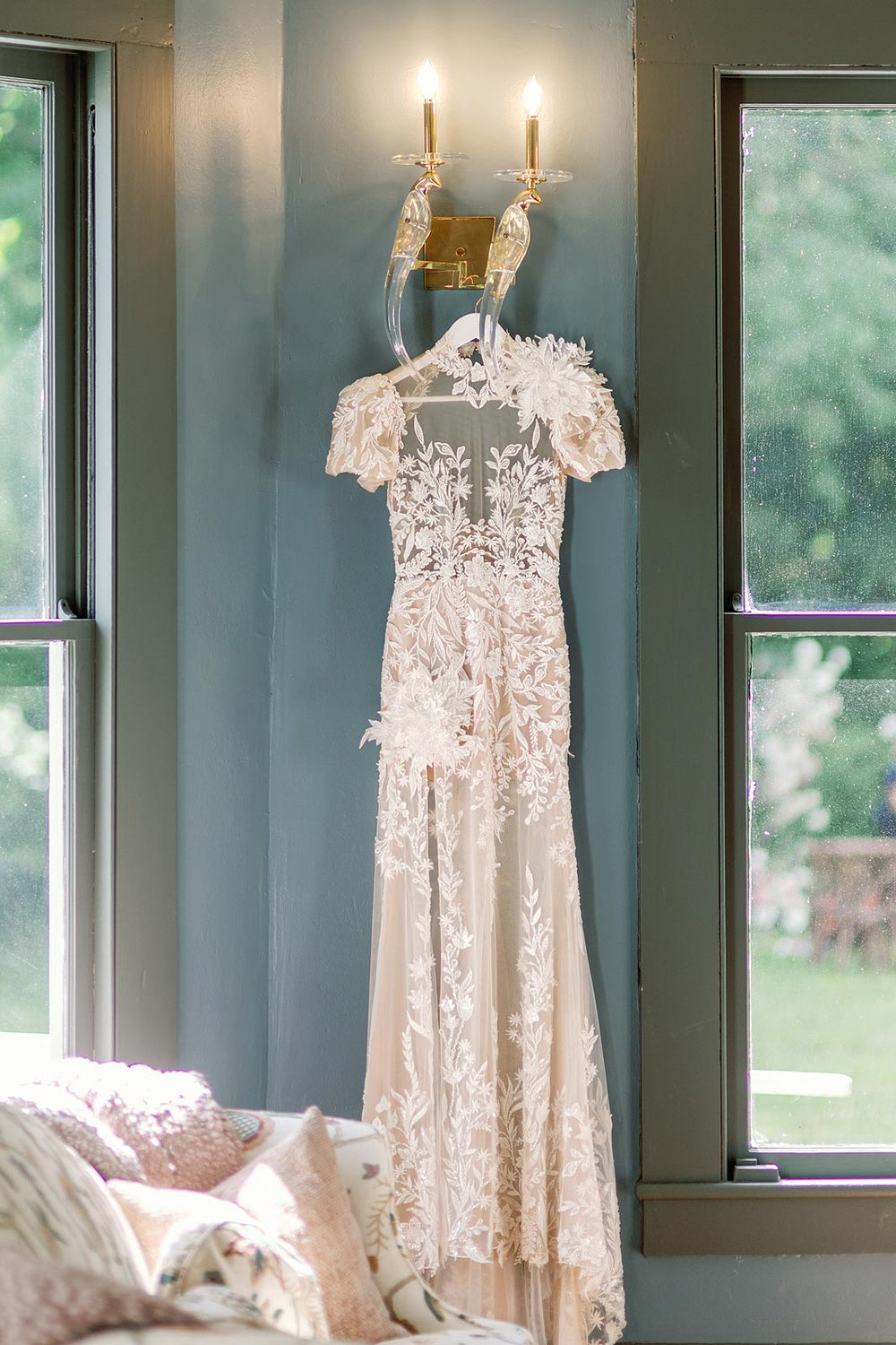 Full-length view of the Rhea mermaid wedding dress with nude-colored sheer illusion lining creating an ultra-feminine silhouette