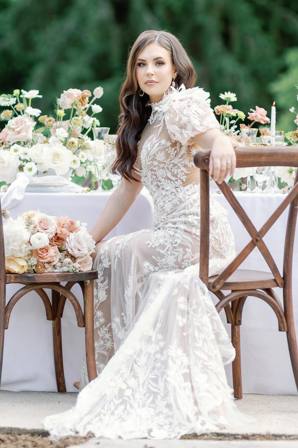 Romantic bridal portrait of bride in the Rhea couture gown with whimsical puff sleeves and illusion lace neckline