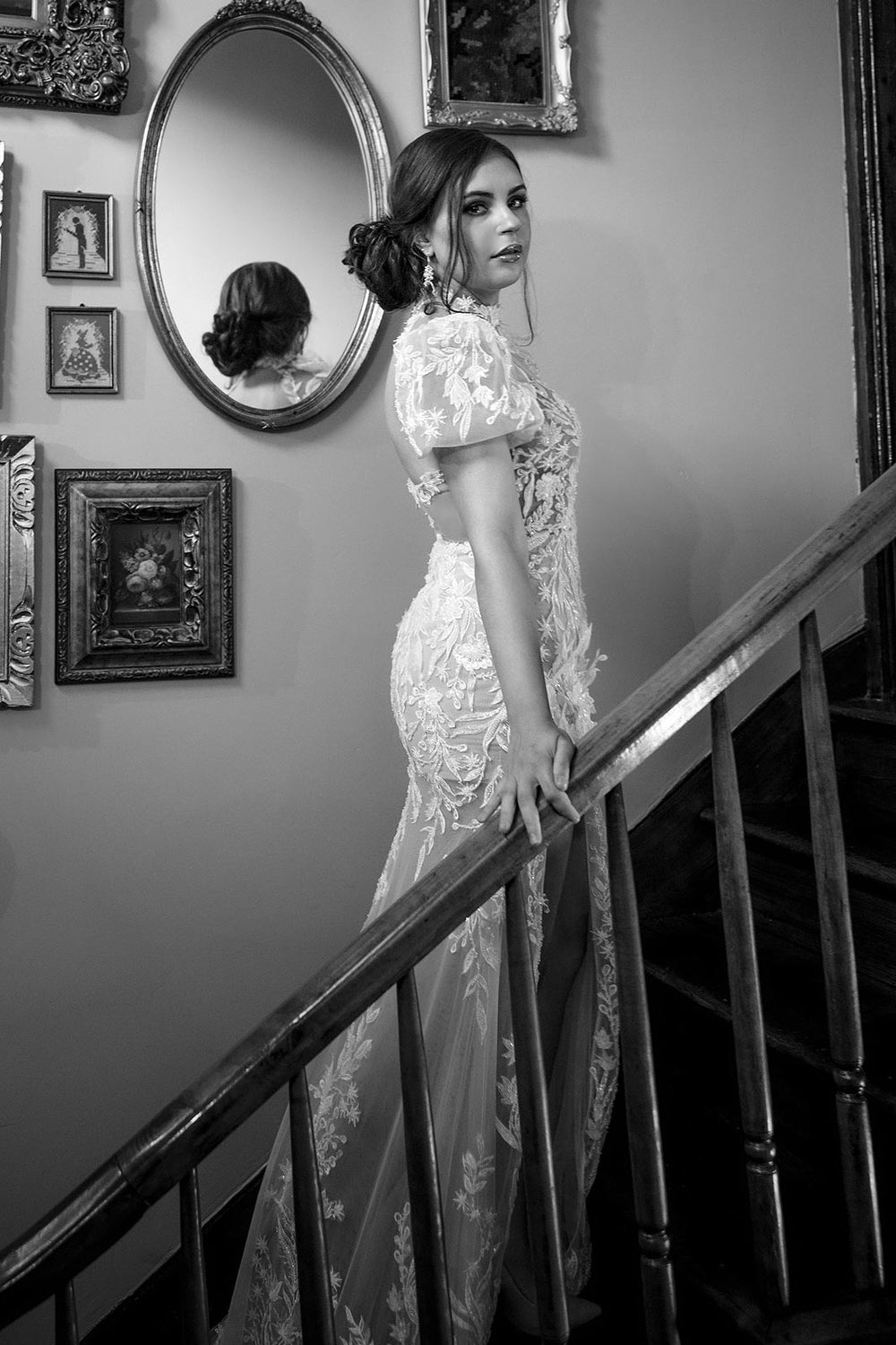 Elegant timeless portrait of bride wearing the Rhea mermaid gown blending classic style with contemporary floral and puff sleeve details