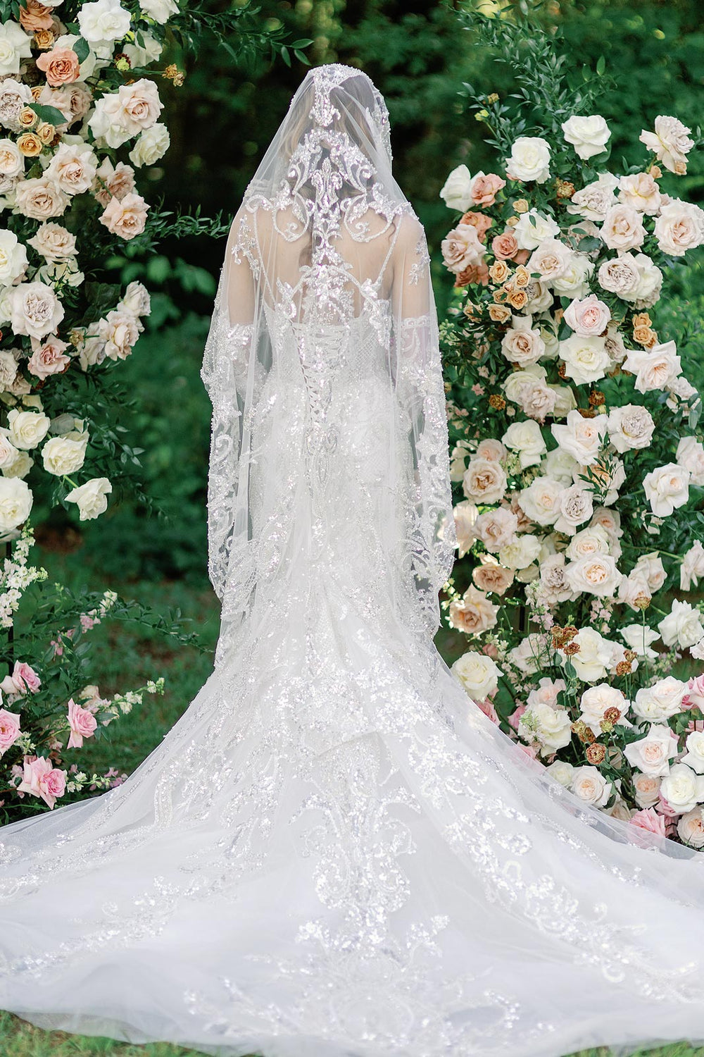 Full bridal look of the Rosalie gown styled with matching veil and gloves for a polished complete ensemble