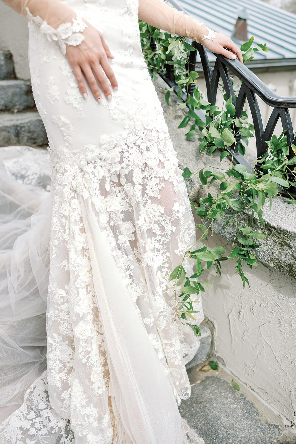 Close-up of 3D sparkly floral lace embellishment on the Vera custom couture wedding dress