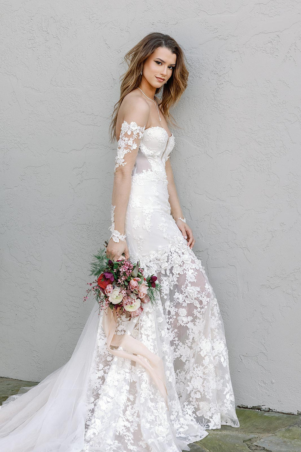 Custom designed Vera wedding dress featuring delicate floral embroidered lace and 3D sparkly lace detail