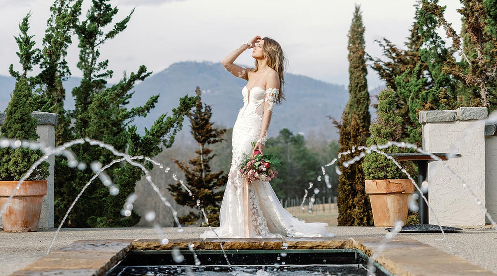 Vera custom mermaid wedding dress by Angela Kim Couture with sweetheart neckline and V cutout bodice