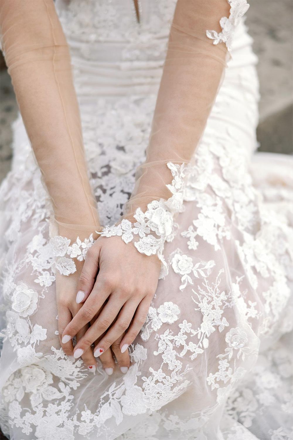 Glamorous fingerless opera gloves styled with the Vera couture wedding dress