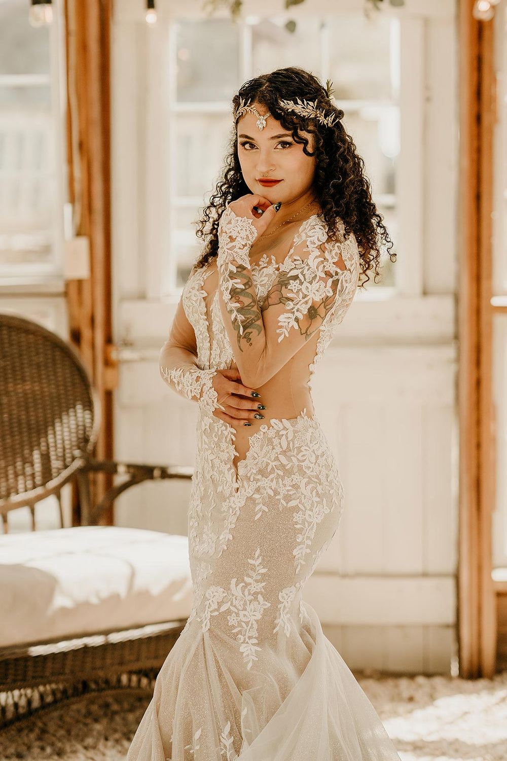 Yume custom couture wedding gown by Angela Kim Couture with mid-thigh flare, off-the-shoulder lace sleeves and cathedral bustle train