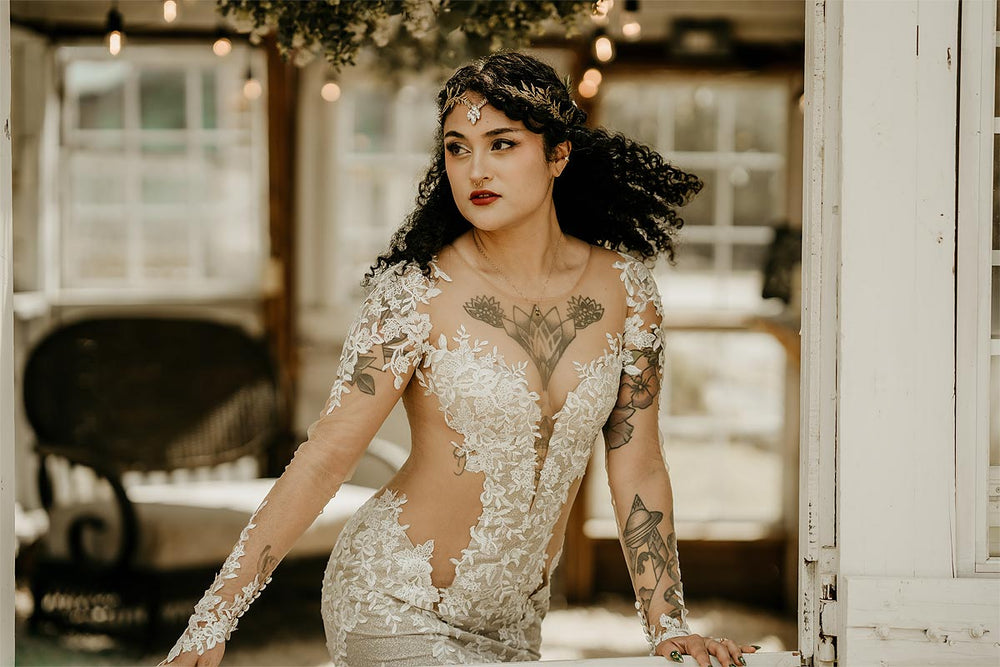 Yume lace wedding dress by Angela Kim Couture featuring romantic off-the-shoulder sleeves with delicate lace embellishments