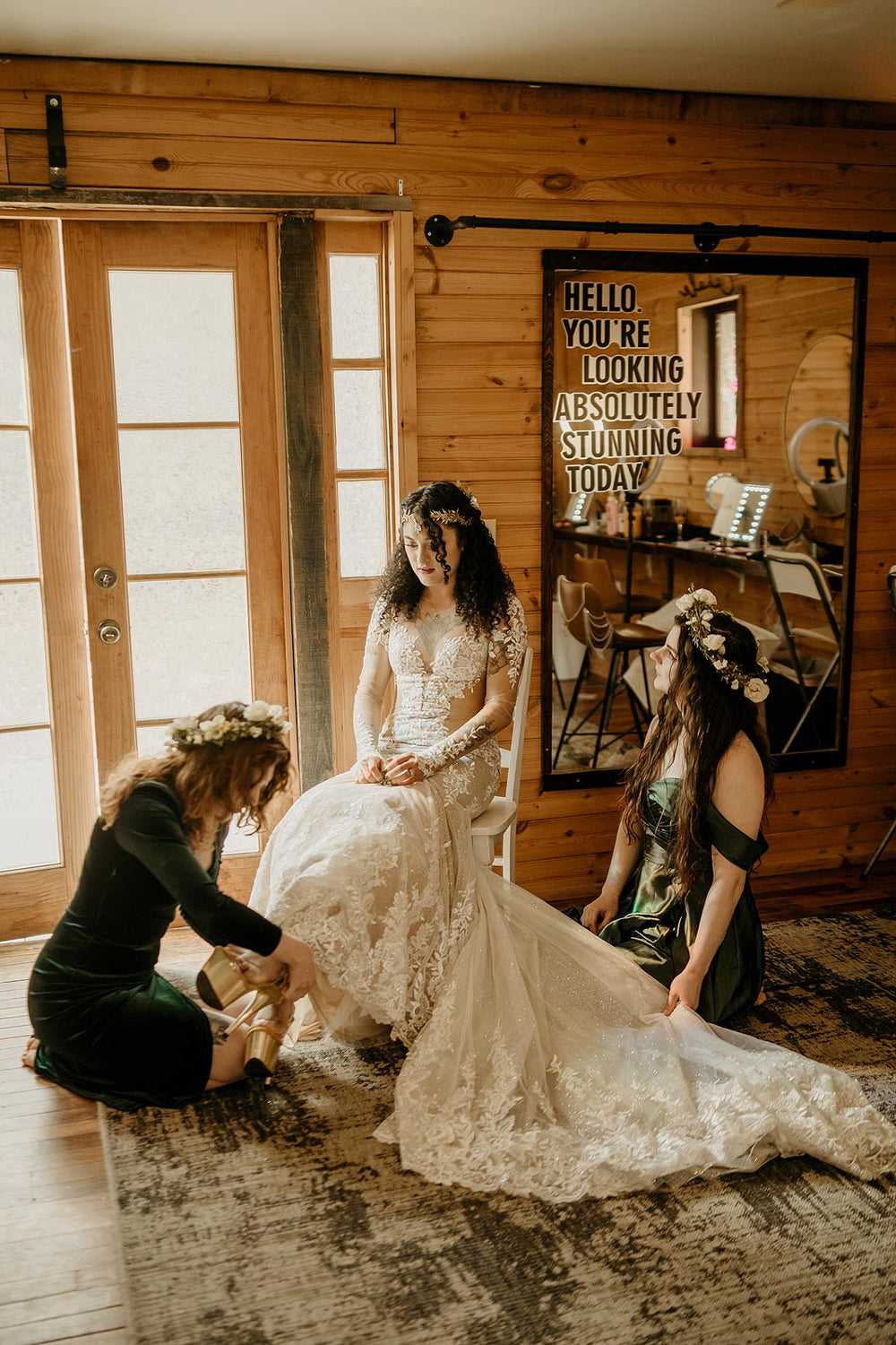 Pre-ceremony bridal portrait of bride wearing the Yume cutout wedding dress by Angela Kim Couture with cathedral train