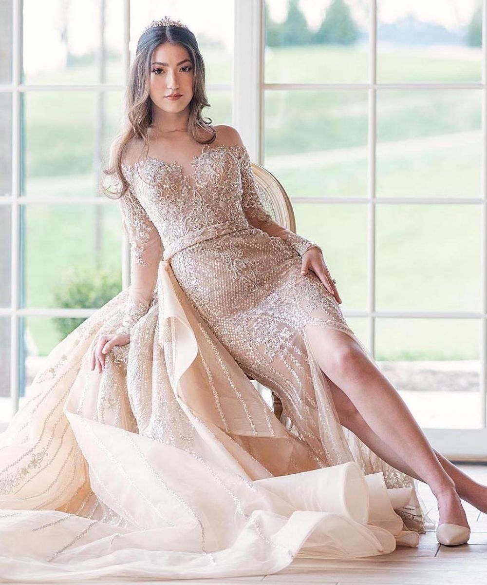 Bespoke hand-beaded wedding dress by Angela Kim Couture with intricate bead embellishments across the bodice designed exclusively for a unique luxury bride