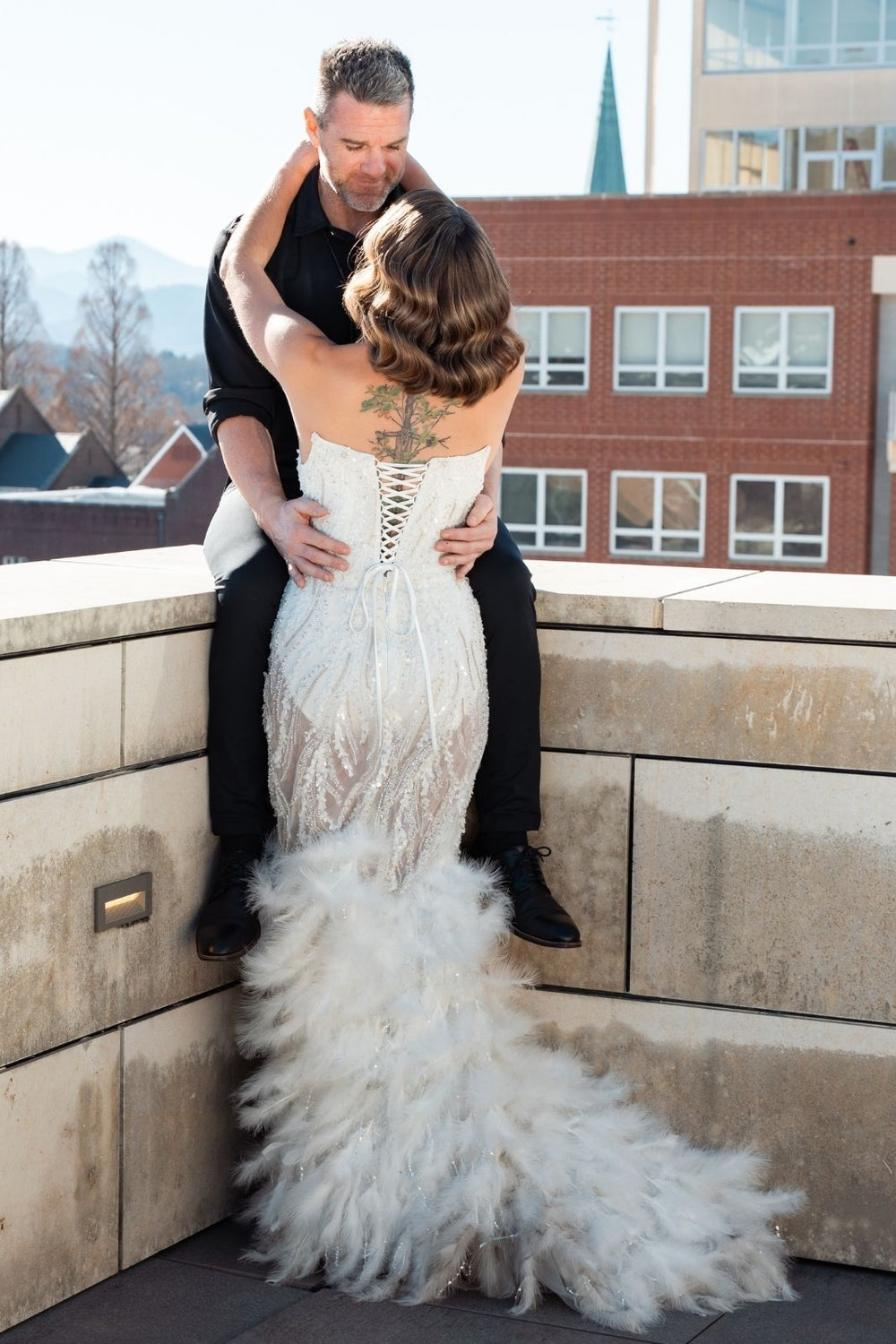 Back view of the Ayla couture wedding dress showing the open back detail and sweeping train