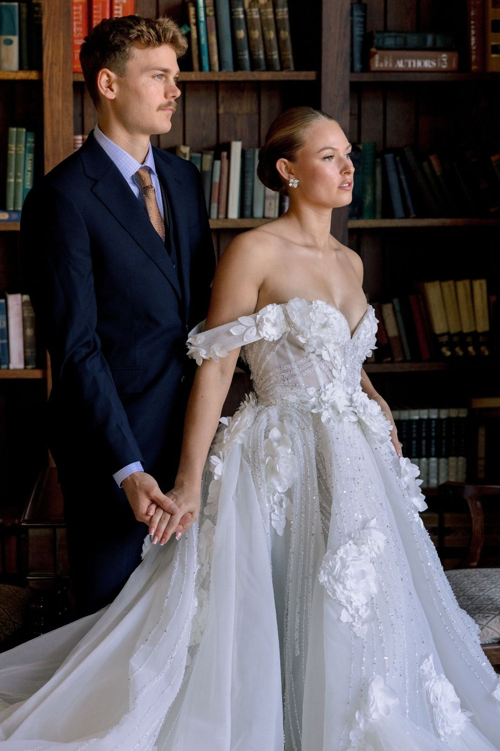 Full voluminous ball skirt silhouette of the Allure couture wedding gown with soft layered tulle