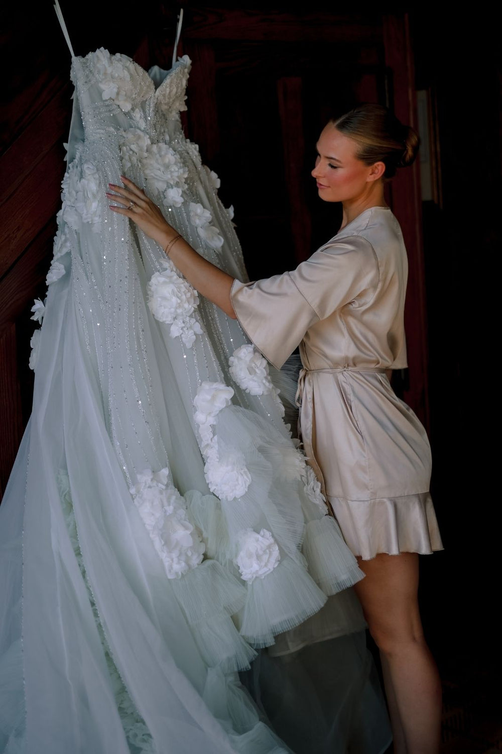 Bride posing with her bespoke Allure wedding gown designed by Angela Kim Couture