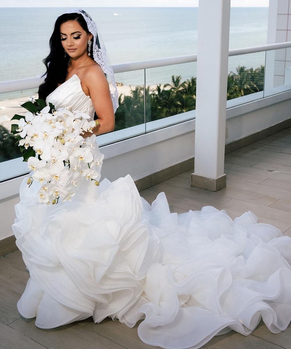 Chelsea custom wedding dress by Angela Kim Couture – a chic bespoke bridal gown with clean lines and luxurious fabric, tailored exclusively to one bride's vision
