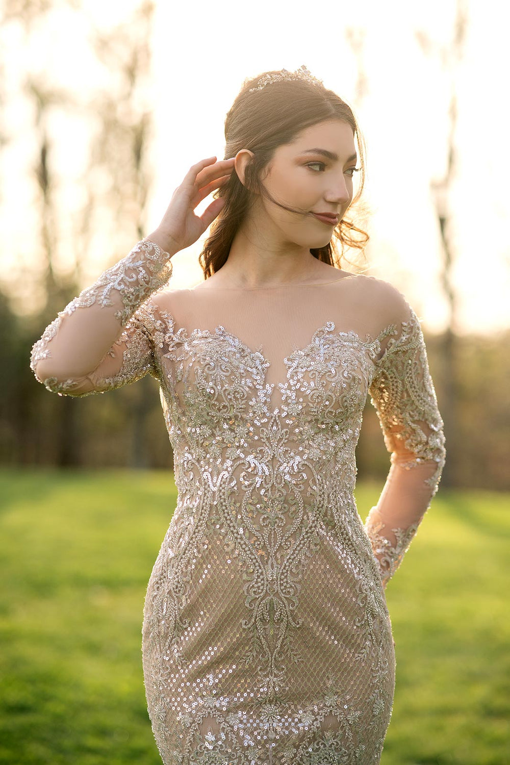 Evelina gold illusion couture wedding dress featuring hand-placed sequins and a body-hugging mermaid cut