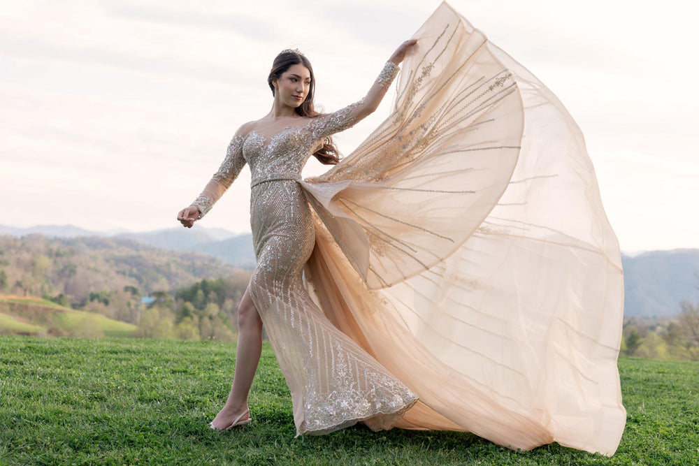 Evelina mermaid wedding dress with a detachable voluminous overskirt showing the two-in-one silhouette