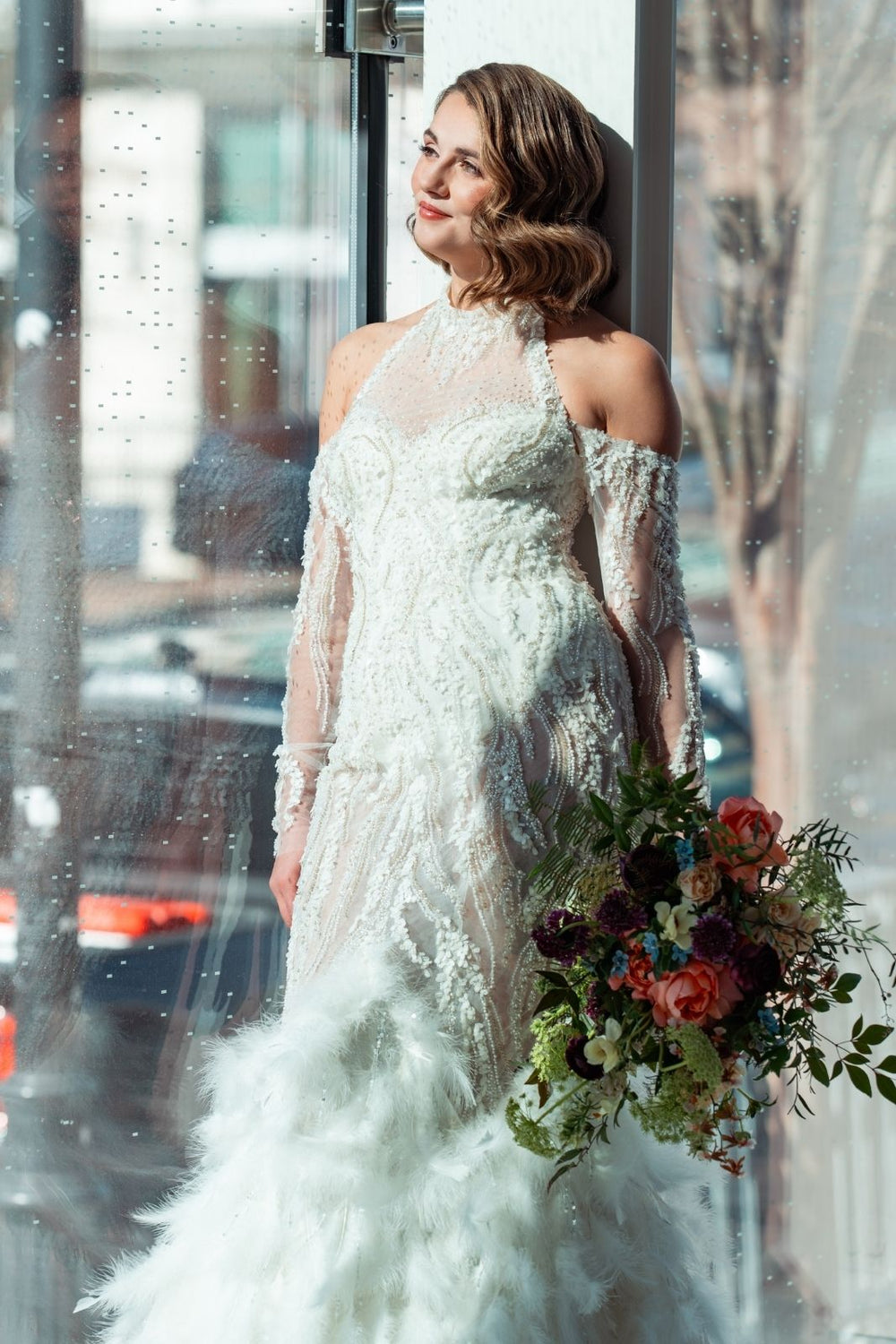 Full-length view of the Ayla glamorous couture bridal gown with a fashion-forward architectural silhouette
