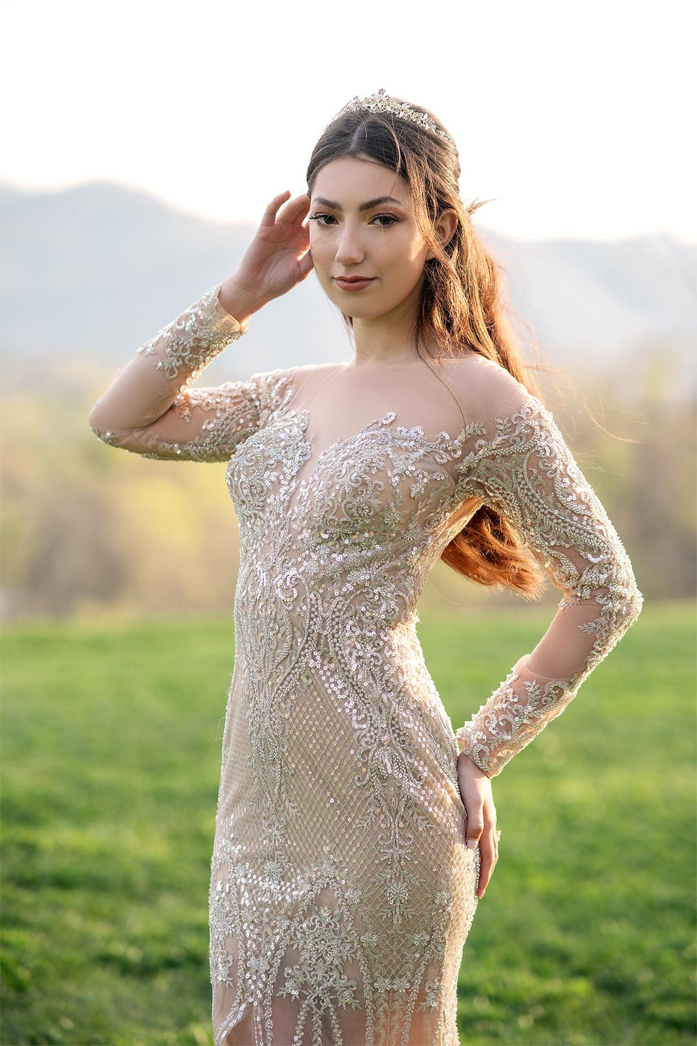 Close-up view of the Evelina gold illusion beaded couture wedding gown with mermaid silhouette