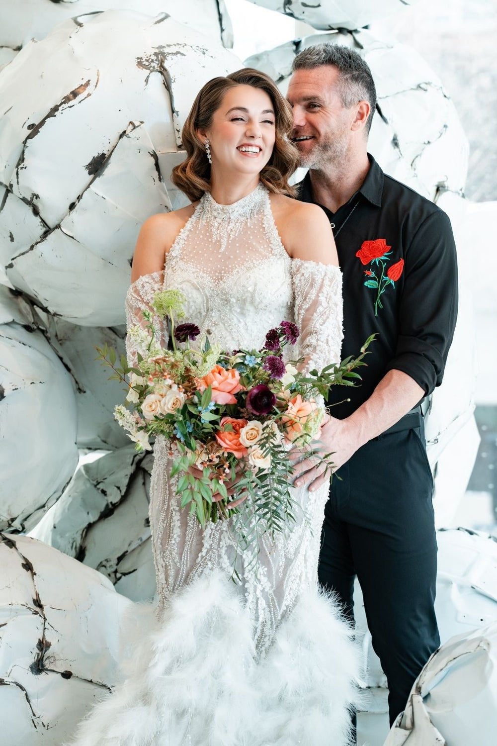 Ayla halterneck couture wedding dress with a sculpted mermaid silhouette and sheer illusion bodice