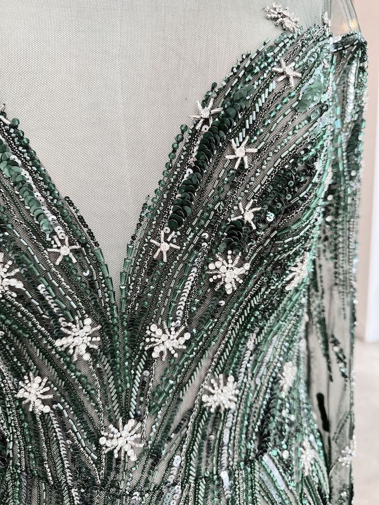 Hand beading detail on Jessica's custom wedding dress by Angela Kim Couture – every bead individually applied as part of the luxury bespoke bridal design process