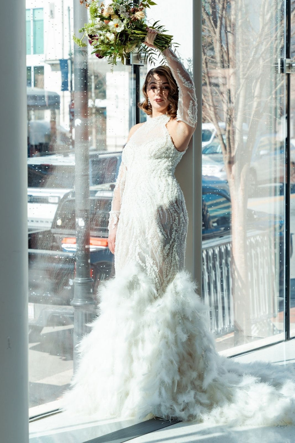 Ayla custom couture wedding dress with alluring sheer layers and a body-hugging mermaid cut