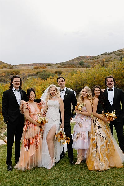 Kaitlin posing with her wedding party.