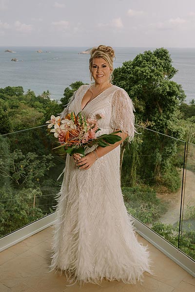 Leah posing in her custom bridal gown in Costa Rica.