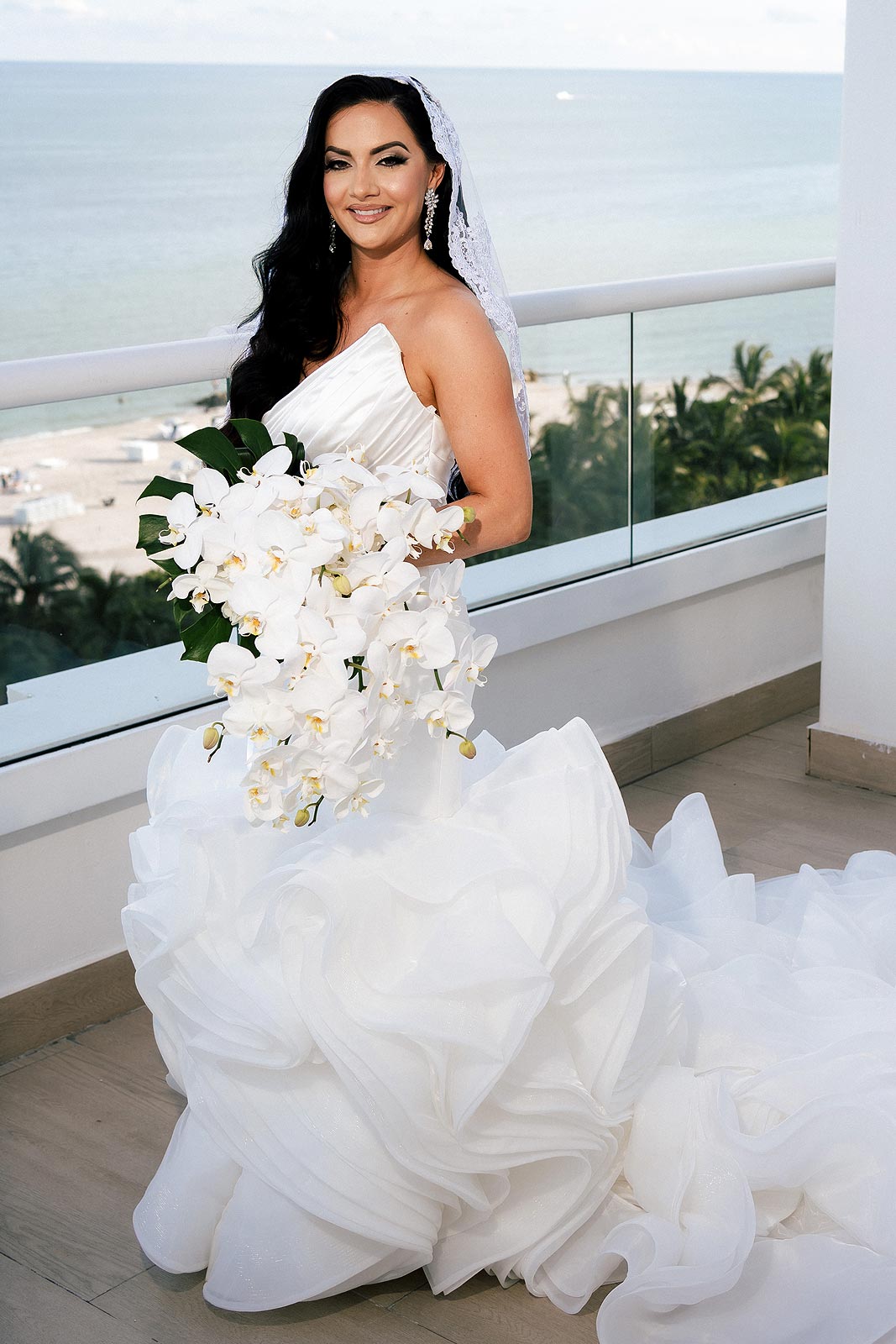 Chelsea wearing her custom bridal gown from Angela Kim Couture