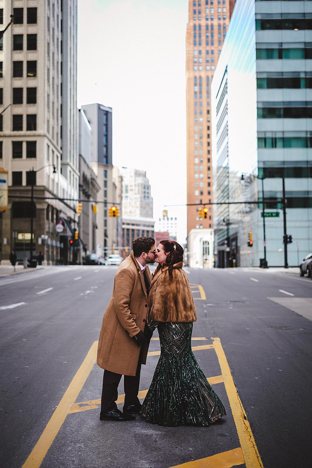Jessica and Tyler kissing in a city street