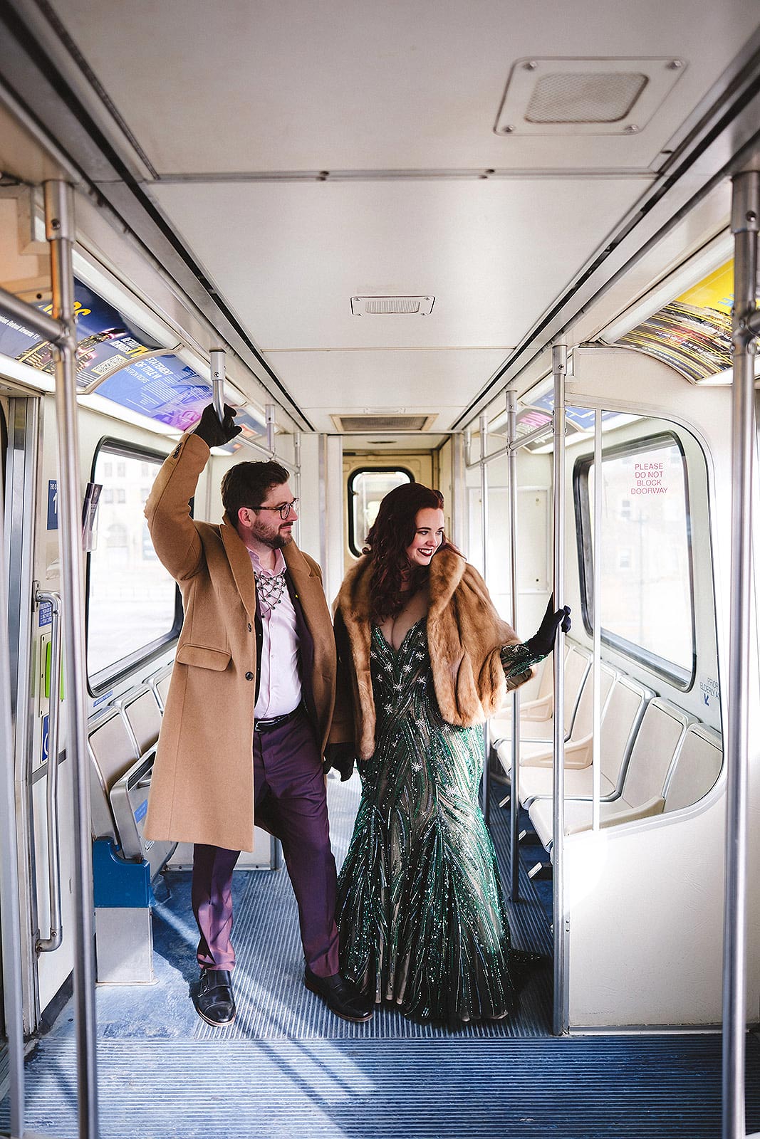 Jessica in her wedding dress on a train