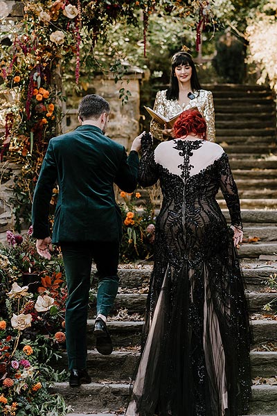Katie and Geoff walking to the wedding altar