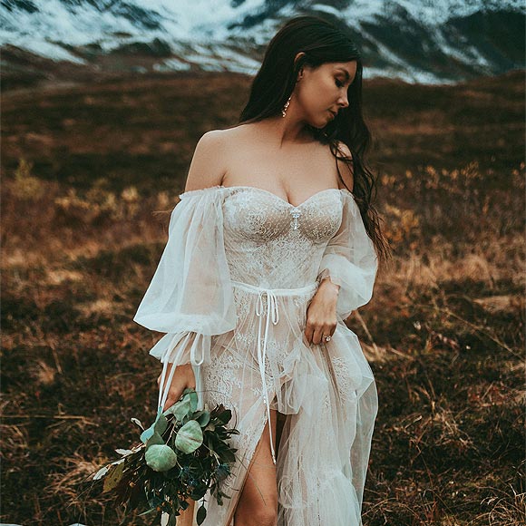 Caroline wearing her custom wedding dress from Angela Kim Couture