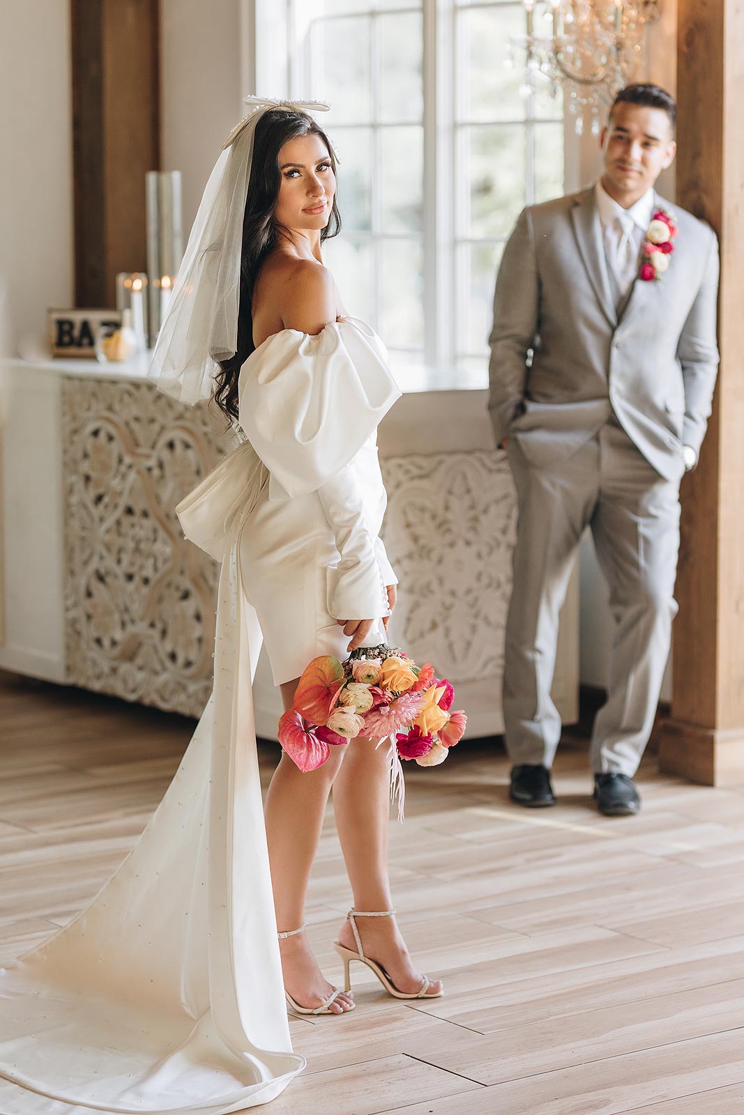 Veronica's custom wedding dress features Juliet sleeves